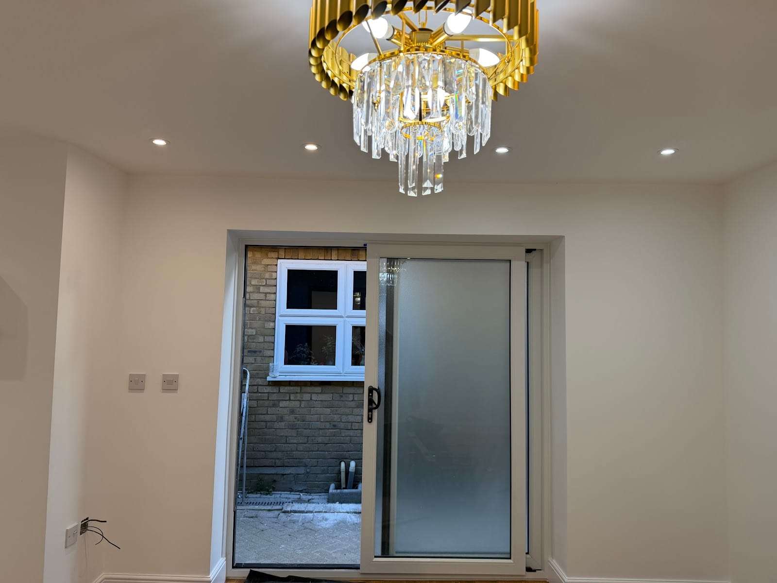 Extension with sliding doors, by Croydon Building Services Ltd